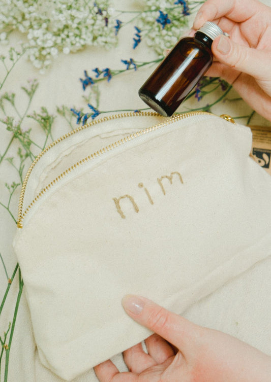 Nim hand embroidered canvas pouch